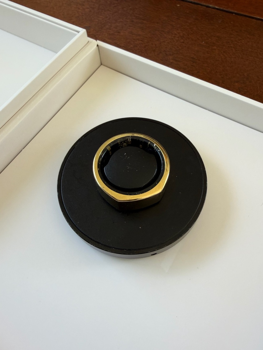Oura Ring Generation 3 Heritage Gold Size 7. Charger included.